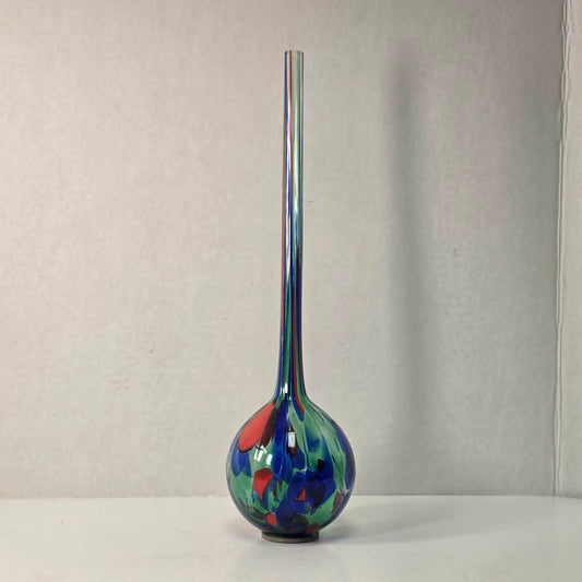 Colorful 14-inch hand-blown glass plant watering ball adding vibrant flair.