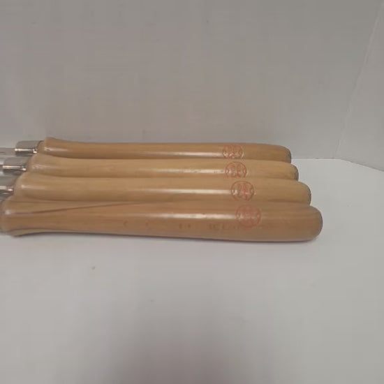 A rare vintage ShopSmith woodturning chisel set in excellent condition, featuring four specialty turning tools.