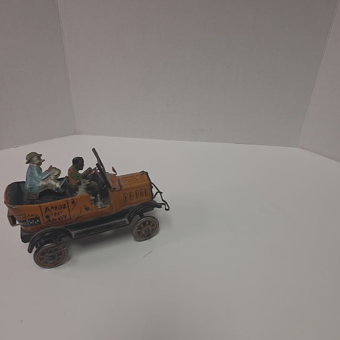 Antique Louis Marx Amos ’n’ Andy Fresh Air Taxi Cab tin lithographed wind-up jalopy toy
