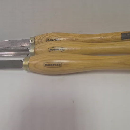 Three vintage Marples woodturning chisels including gouge, parting tool, and turning chisel.