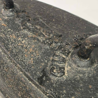 Antique cast iron tailor's press iron made in Guelph Ontario with beautifully formed handle.
