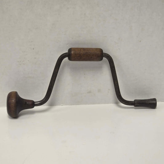 Antique petite hand-powered woodworking bit brace measuring 11 inches.
