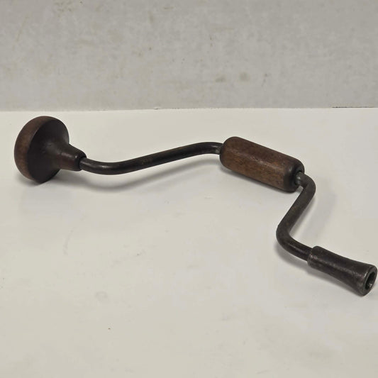 Antique petite hand-powered woodworking bit brace measuring 11 inches.
