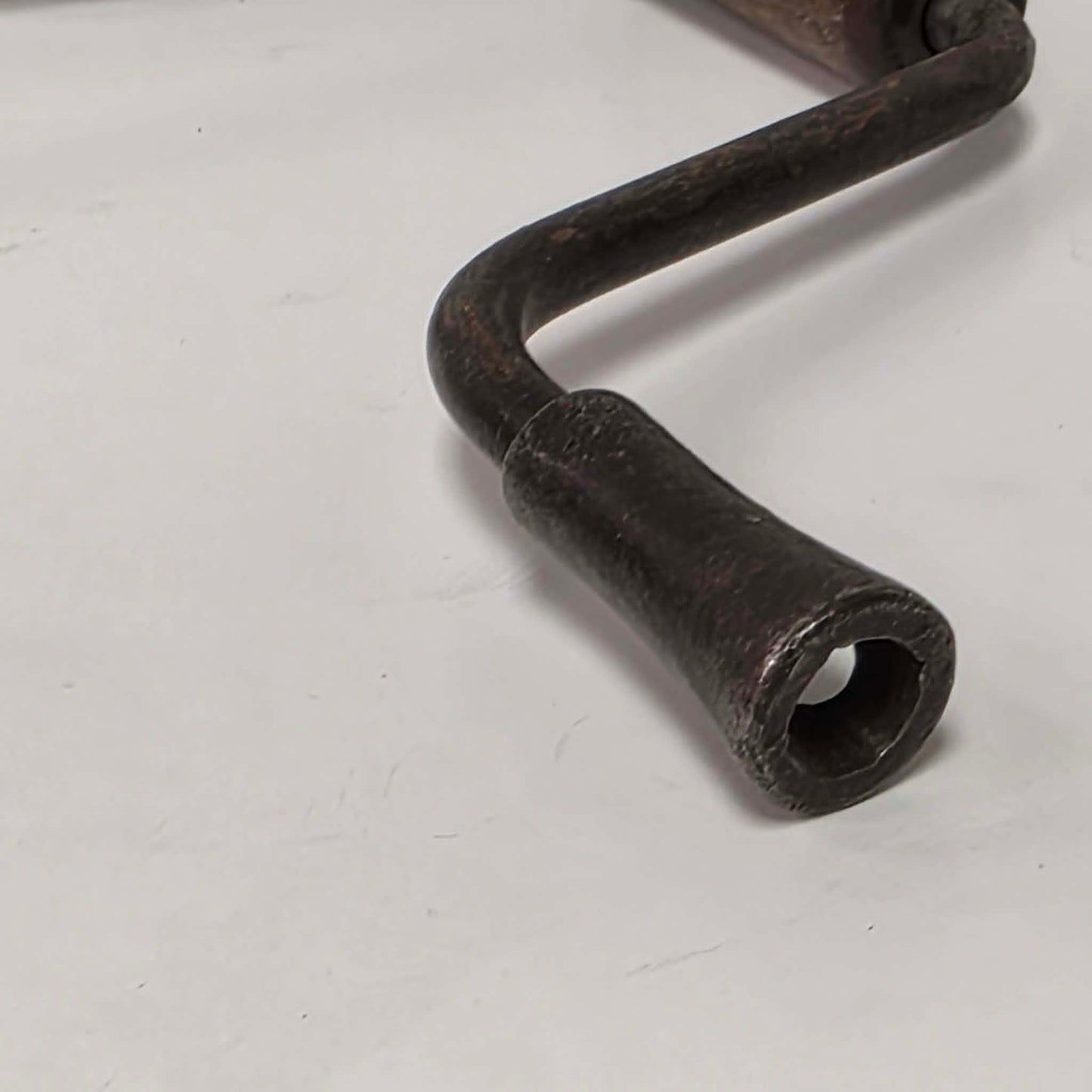 Antique petite hand-powered woodworking bit brace measuring 11 inches.
