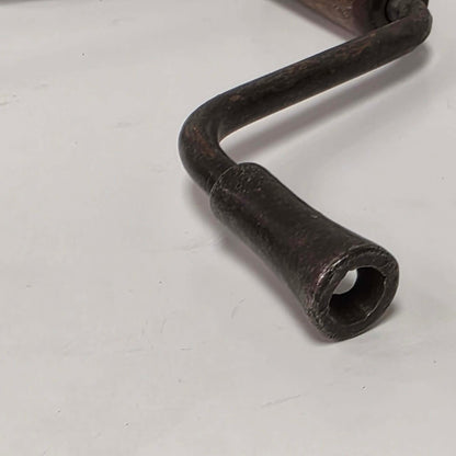 Antique petite hand-powered woodworking bit brace measuring 11 inches.
