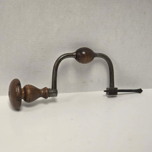 Antique J.G.B.N.S. walnut-handled bit brace with original drill bit.

