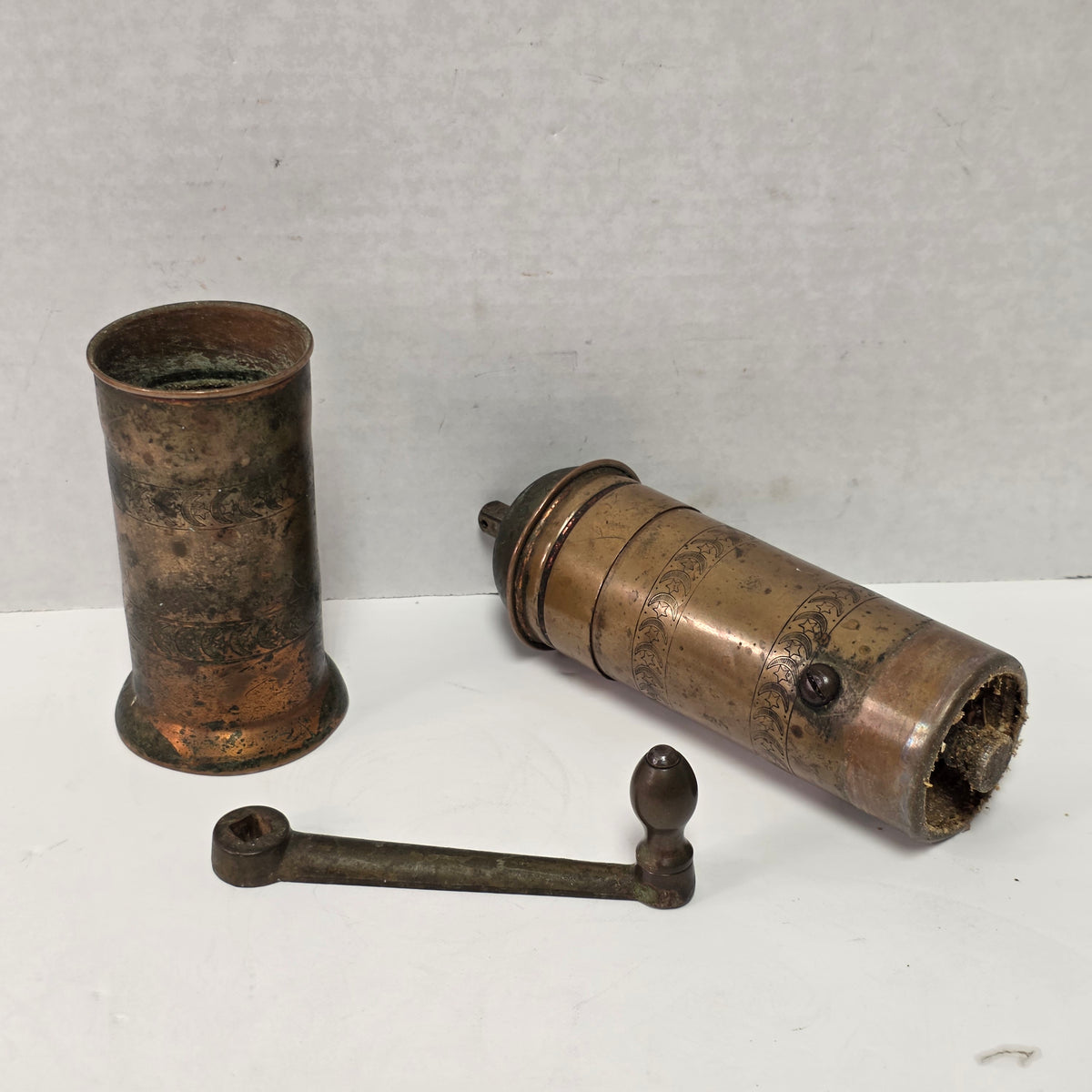 Nine-inch primitive antique hand-crank pepper grinder