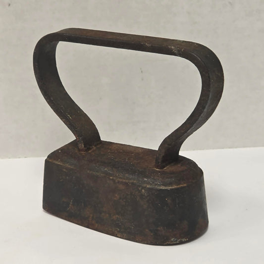 Late 19th-century antique tugboat-style cast iron sad clothes iron from Troy New York.
