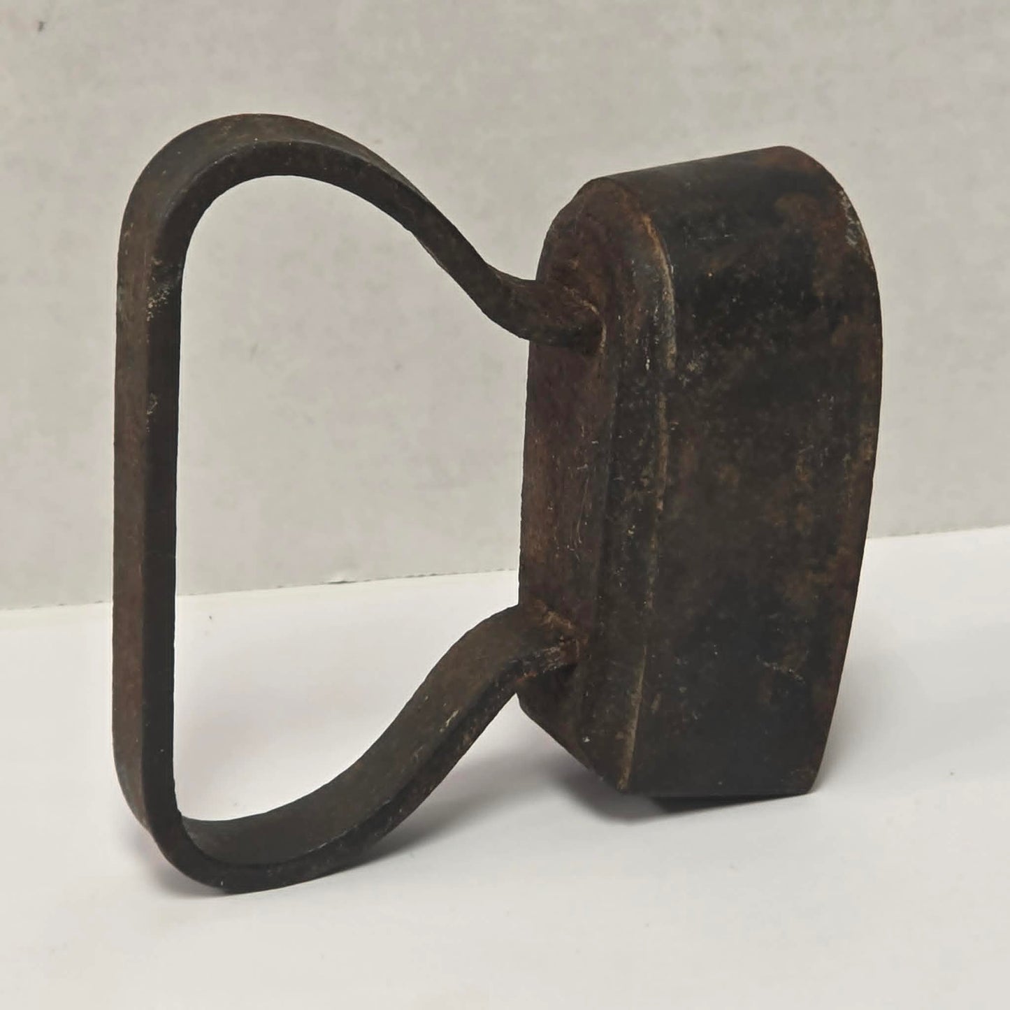 Late 19th-century antique tugboat-style cast iron sad clothes iron from Troy New York.
