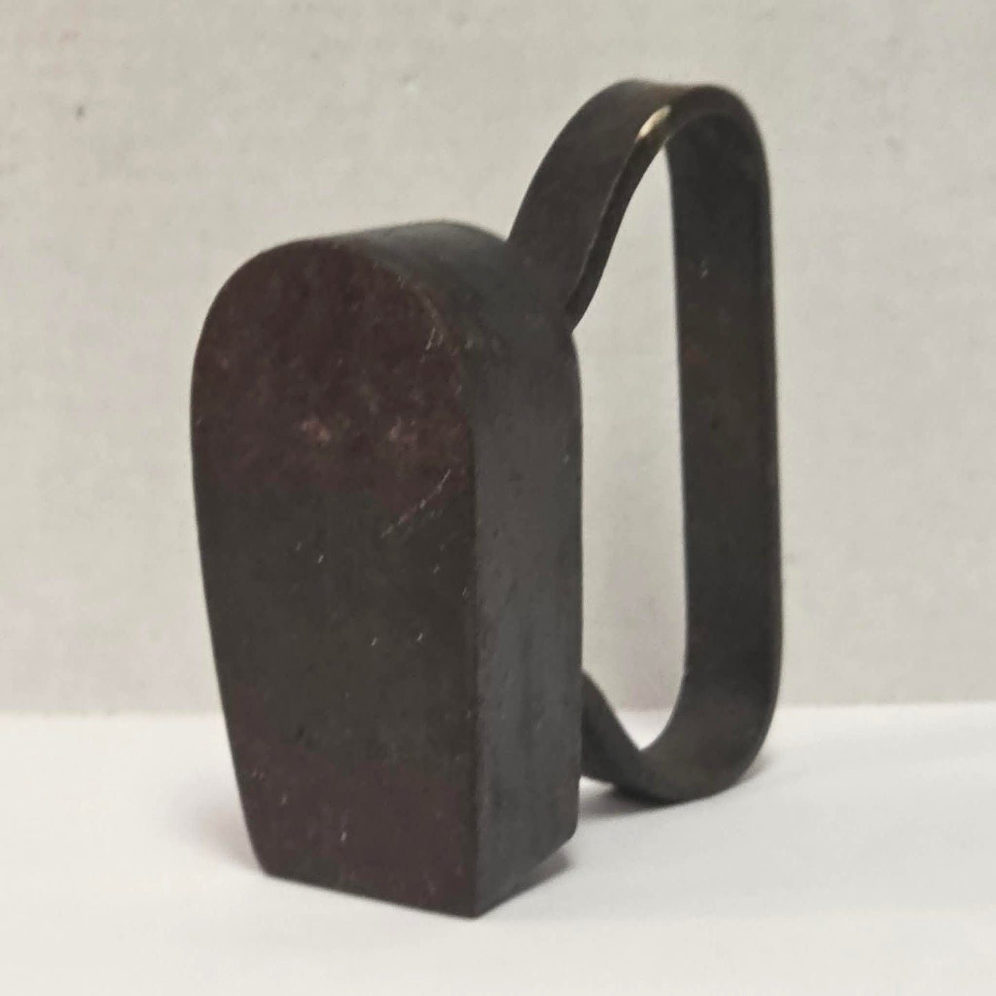Late 19th-century antique tugboat-style cast iron sad clothes iron from Troy New York.
