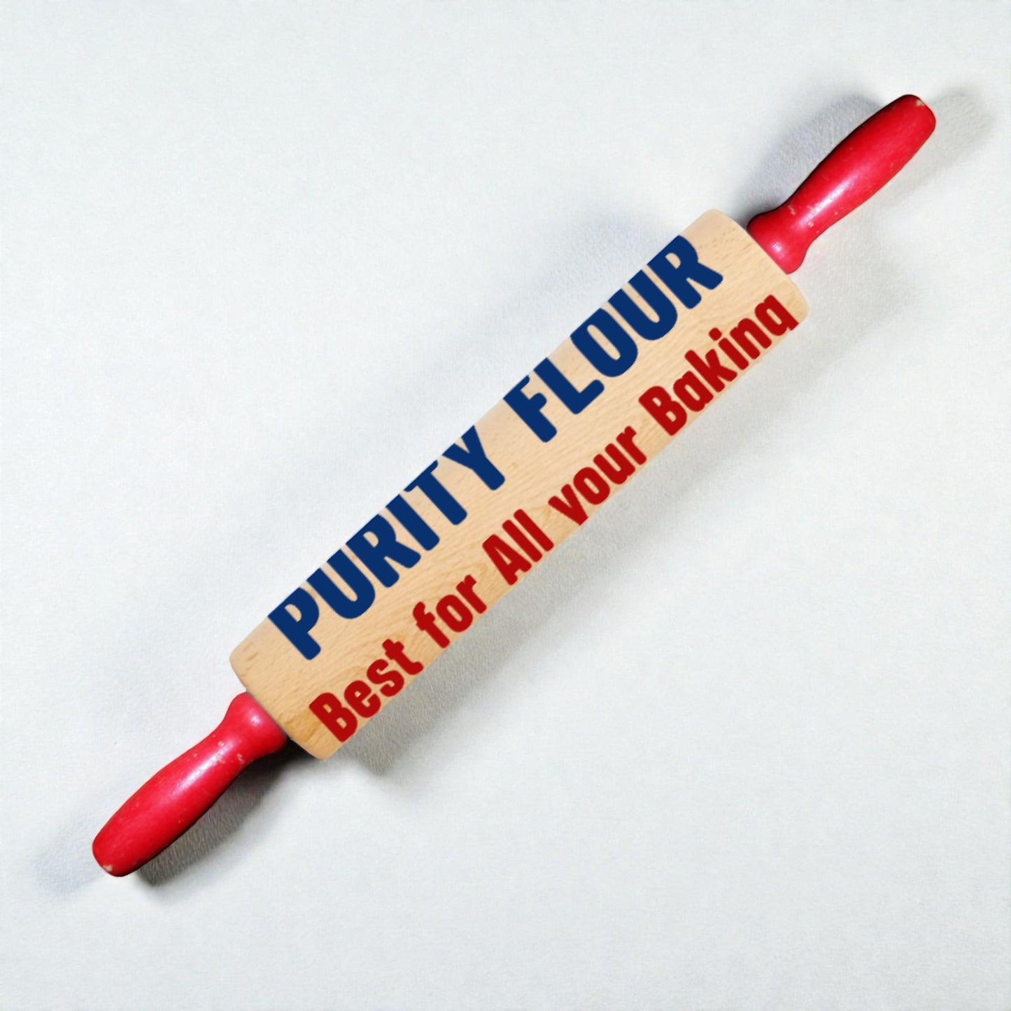 Rolling pin with 'Purity Flour' branding on a white background