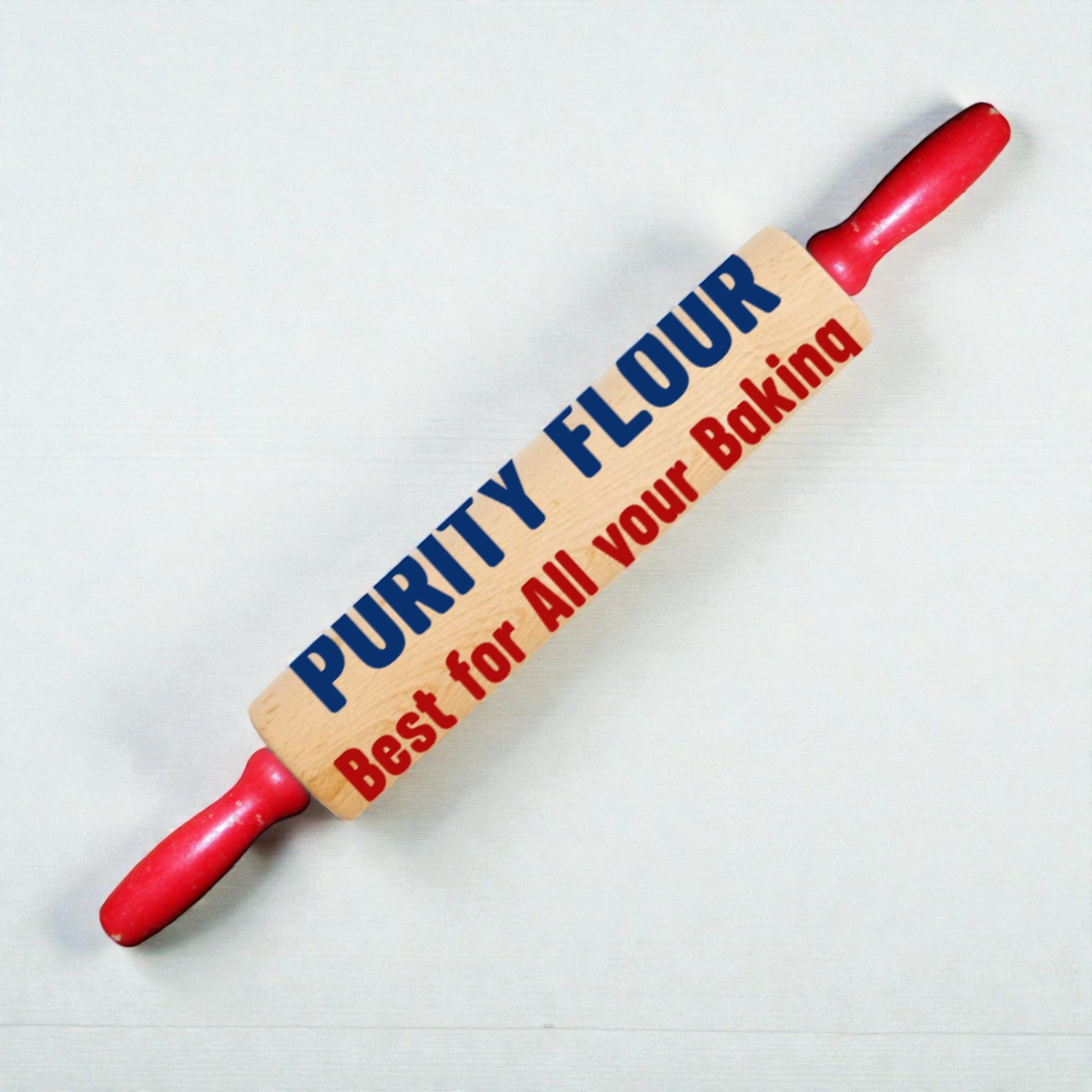 Rolling pin with 'Purity Flour' branding on a white background