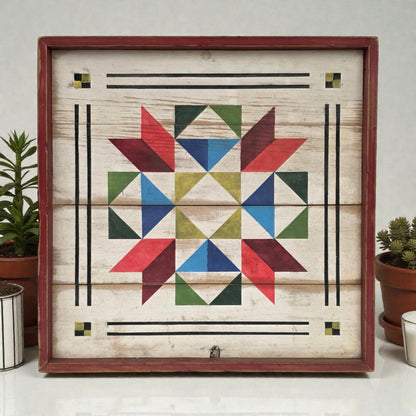 Framed geometric art piece with a star design on a wooden background