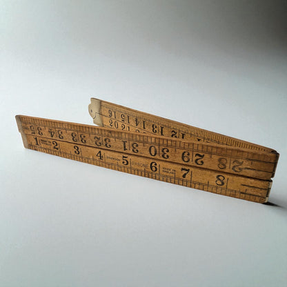 Wooden ruler on a white background