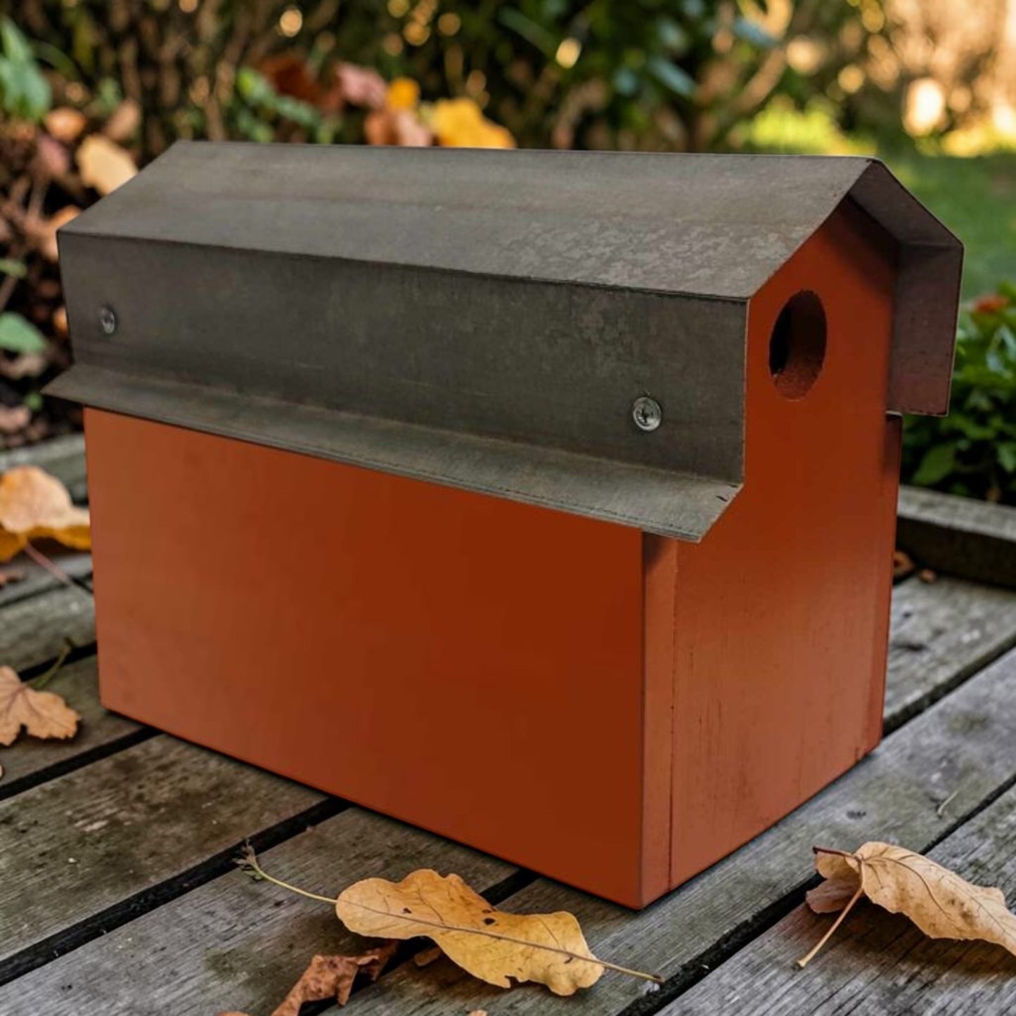 Red reclaimed barn tin Rock City double birdhouse with “See 7 States” hand lettering and two nesting compartments.