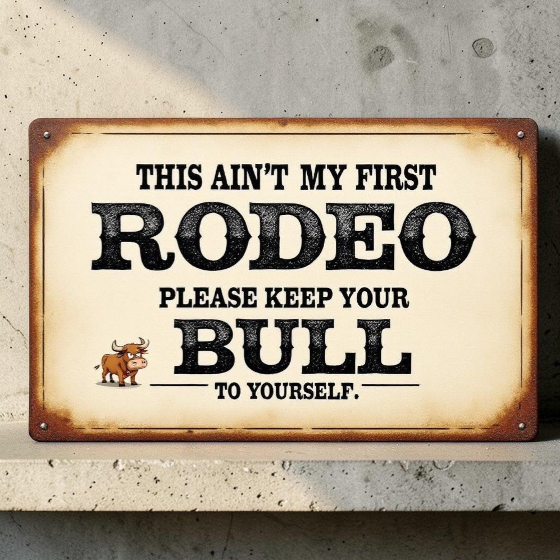 Vintage-style sign with humorous rodeo-themed text on a concrete wall.
