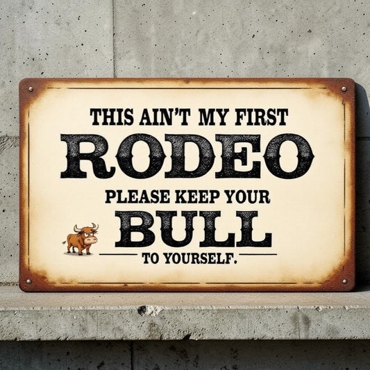Vintage-style sign with humorous rodeo-themed text on a concrete wall.