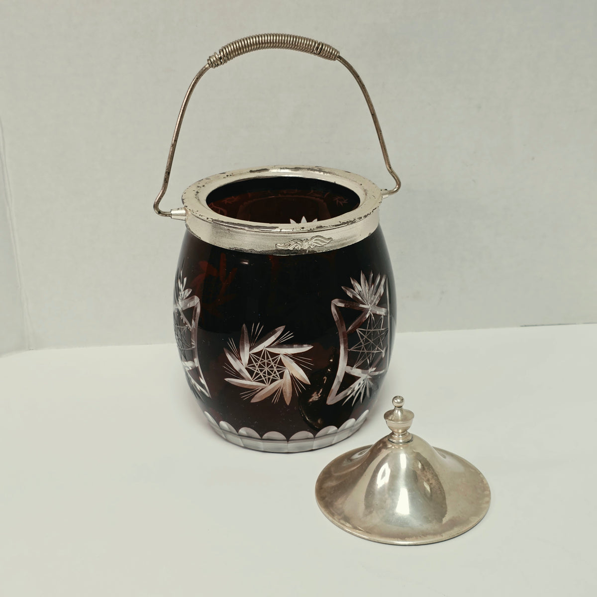 Ruby Flash American biscuit barrel with deep red cut to clear glass and metal handle

