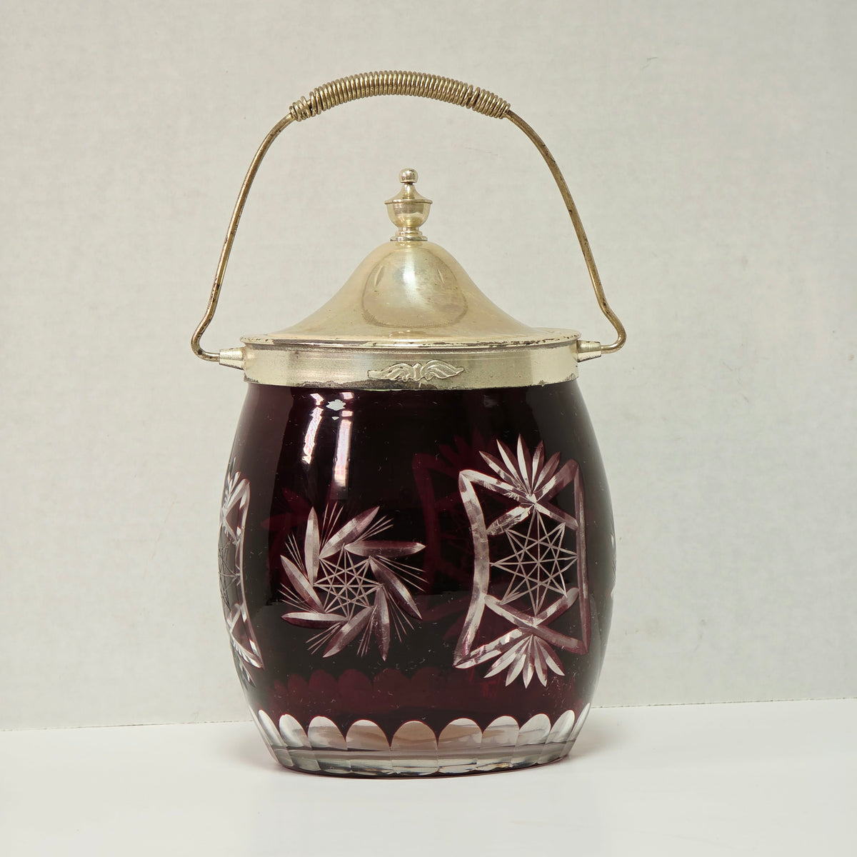 Ruby Flash American biscuit barrel with deep red cut to clear glass and metal handle
