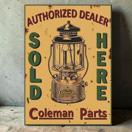 Rustic yellow Coleman Authorized Dealer Parts Sold Here sign featuring an early Quick-Lite lantern.
