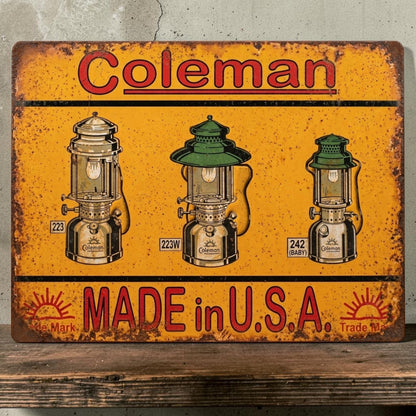 Rustic handmade Coleman Made in USA aluminum sign featuring three weathered Coleman lanterns.
