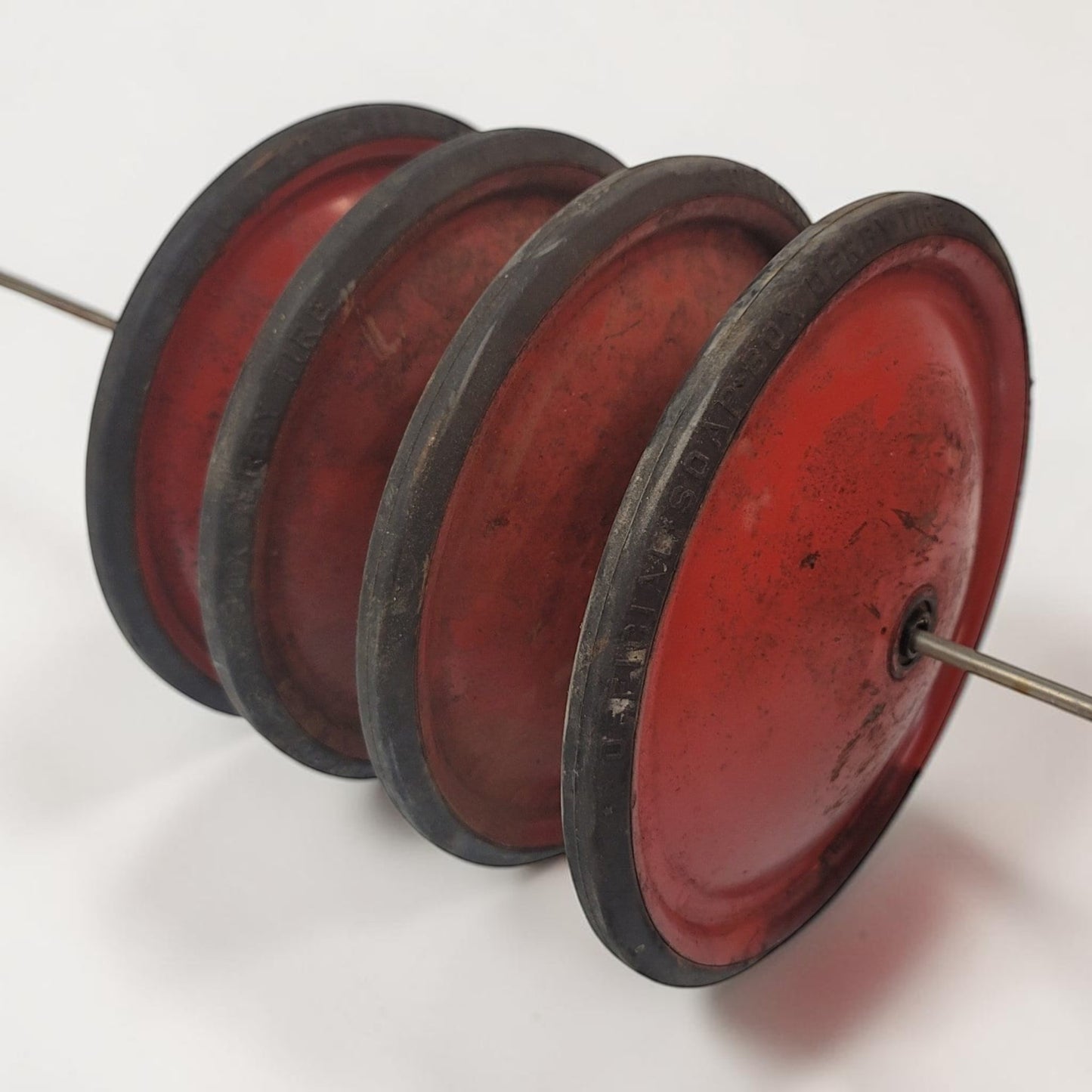 Authentic vintage Soap Box Derby wheels with original embossed official rubber tires.