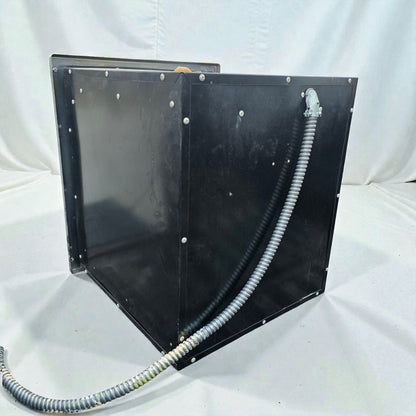 Black metal enclosure with a hose on a white background