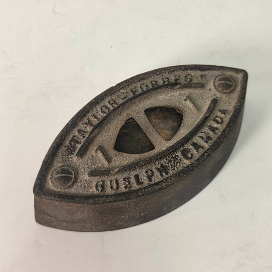 Antique Taylor Forbes No. 1 sad iron made in Guelph, Ontario, Canada.