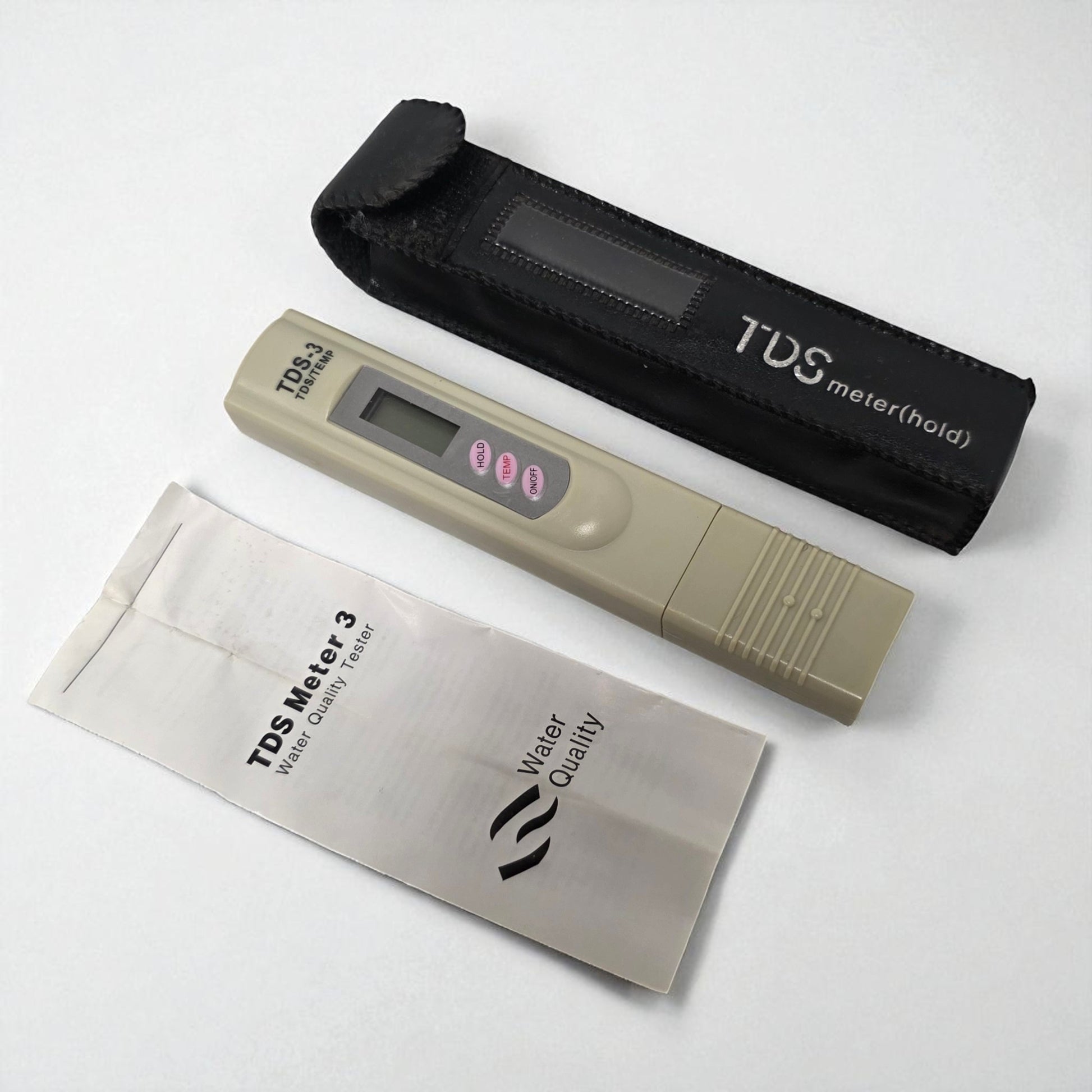 TDS meter with carrying case on a white background
