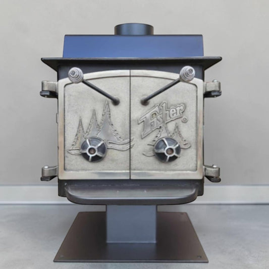 Vintage Fisher Teddy Bear wood stove with full factory nickel doors and pedestal base.
