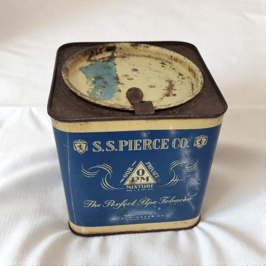 Vintage S.S. Pierce Co. tobacco tin on a white background