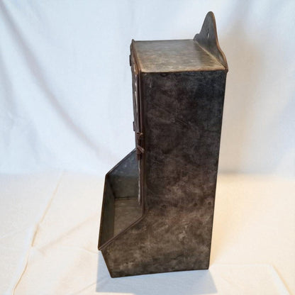Metallic rectangular box with a hinged lid on a white background