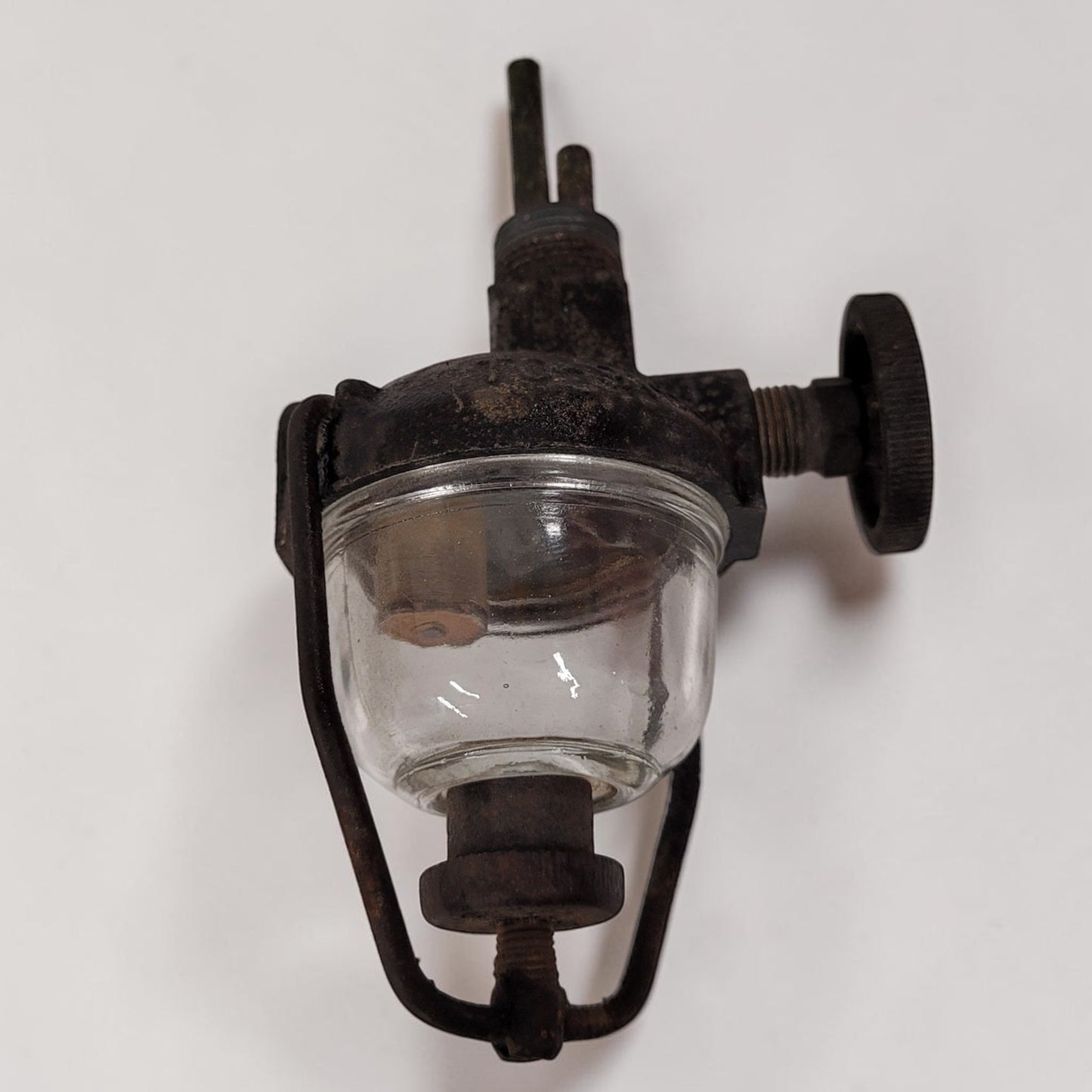 Antique HE T0-9165 fuel sediment bowl used on vintage tractors and hit and miss engines with glass fuel filter bowl.