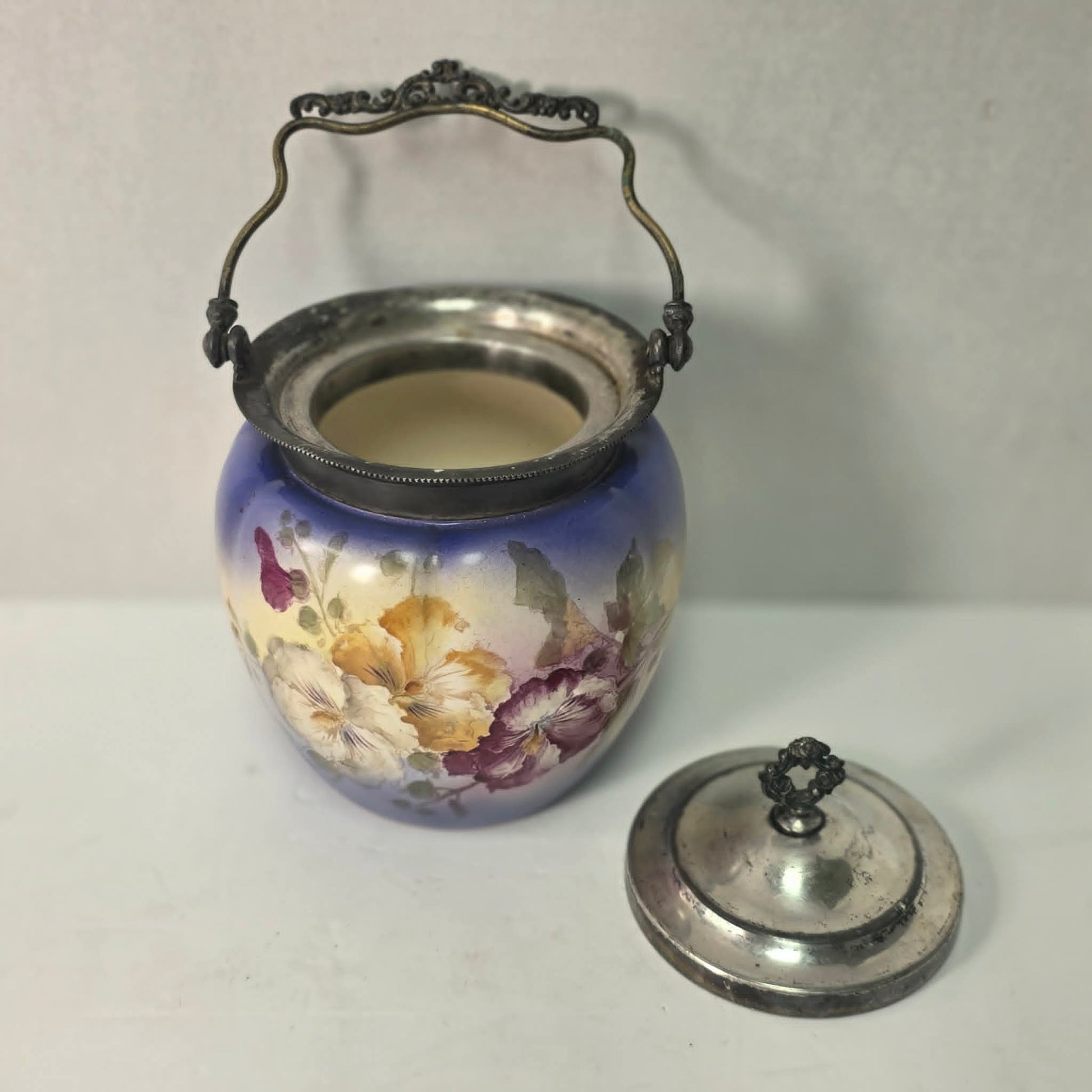 Victorian purple glass biscuit barrel with floral decoration and silver lid, circa 1880s