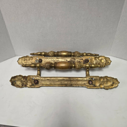 Pair of large Victorian brass bronze hotel door handles with butterfly design, crosshatched plates, and shell details. Antique architectural salvage hardware.