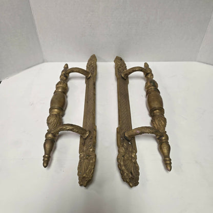 Pair of large Victorian brass bronze hotel door handles with butterfly design, crosshatched plates, and shell details. Antique architectural salvage hardware.