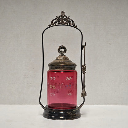 Victorian cranberry glass cruet with bird claw tongs
