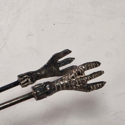 Victorian cranberry glass cruet with bird claw tongs
