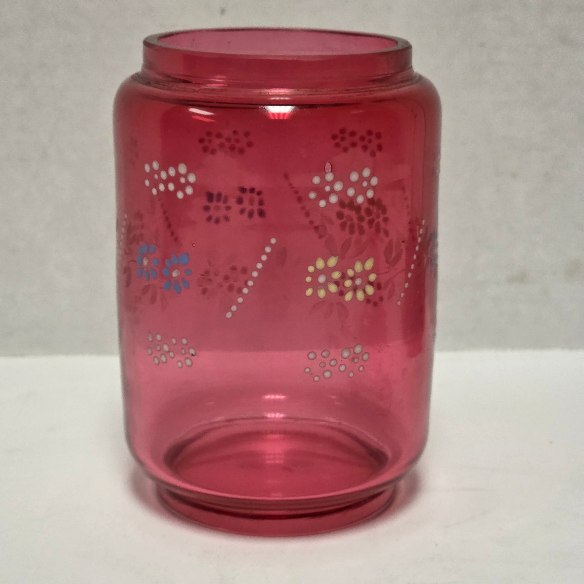 Victorian cranberry glass cruet with bird claw tongs
