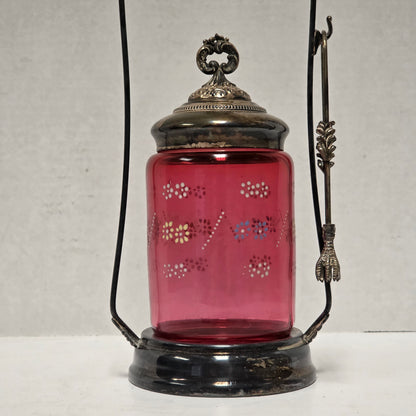 Victorian cranberry glass cruet with bird claw tongs

