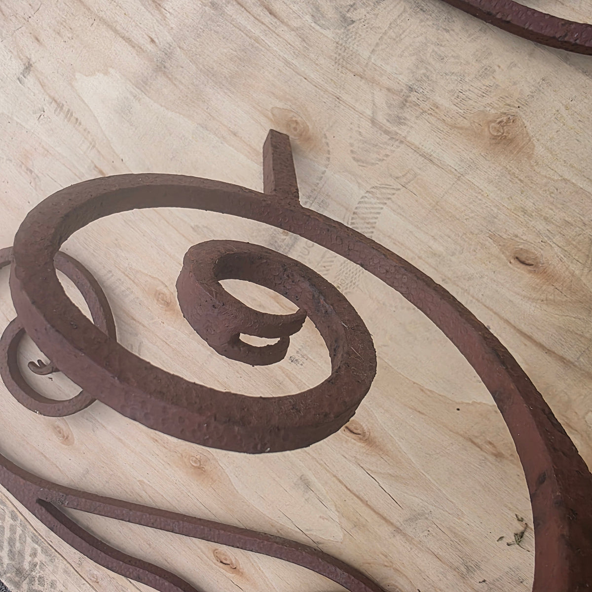 Distinctive hand-forged iron scrollwork for architectural and restoration projects.