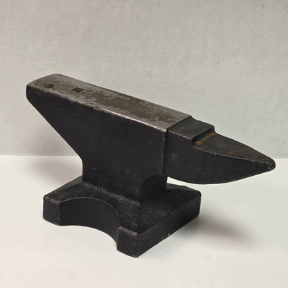 Vintage 22½ pound cast iron anvil with hardy hole and pritchel hole.
