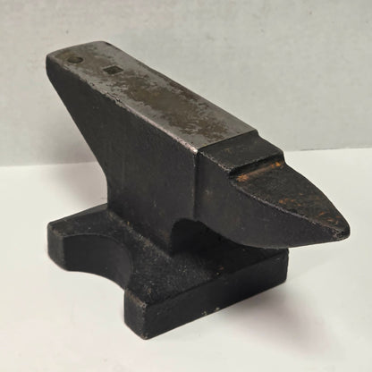Vintage 22½ pound cast iron anvil with hardy hole and pritchel hole.

