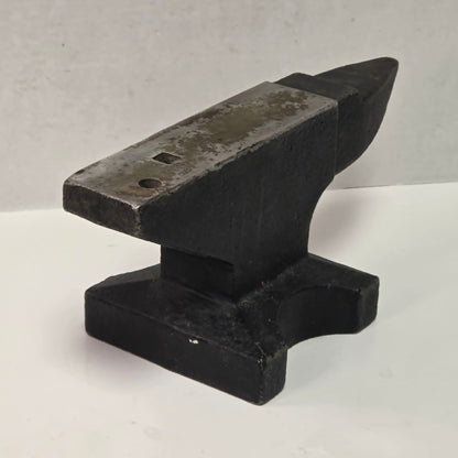 Vintage 22½ pound cast iron anvil with hardy hole and pritchel hole.
