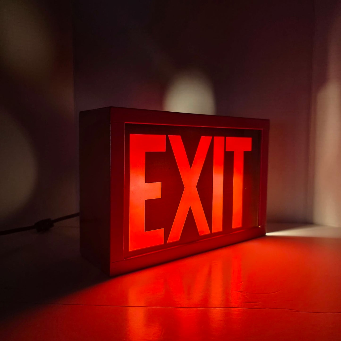 Functional vintage theater exit sign with original glass and toggle switch.