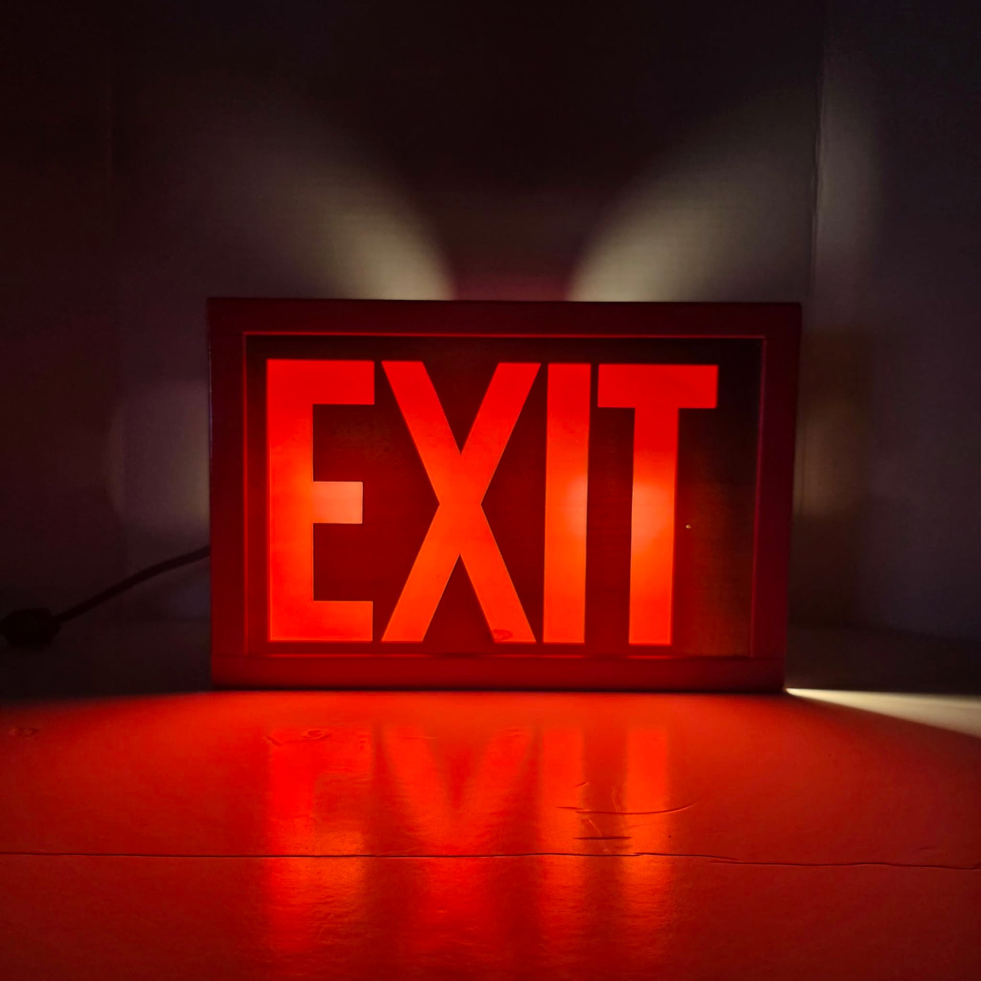 Functional vintage theater exit sign with original glass and toggle switch.