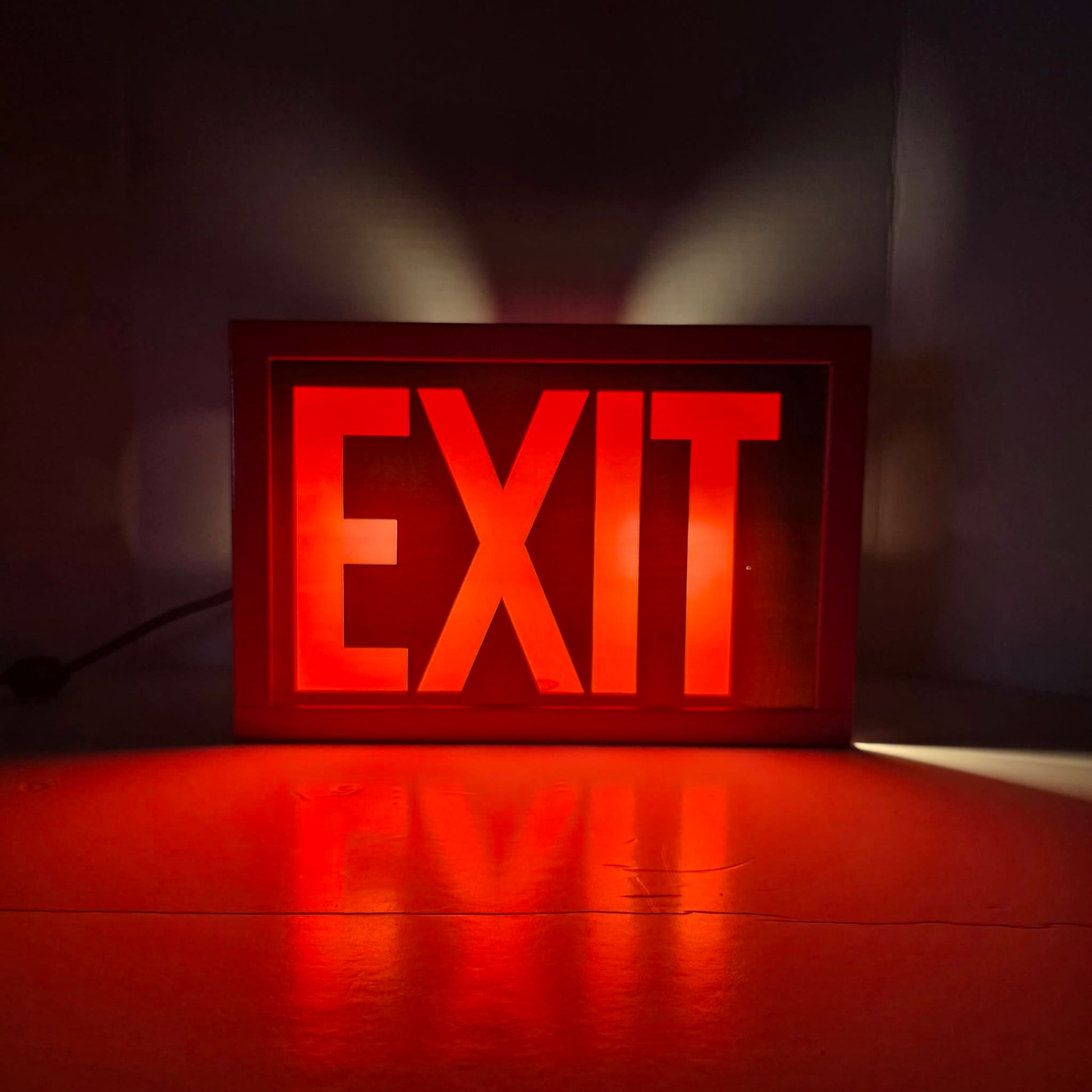 Functional vintage theater exit sign with original glass and toggle switch.
