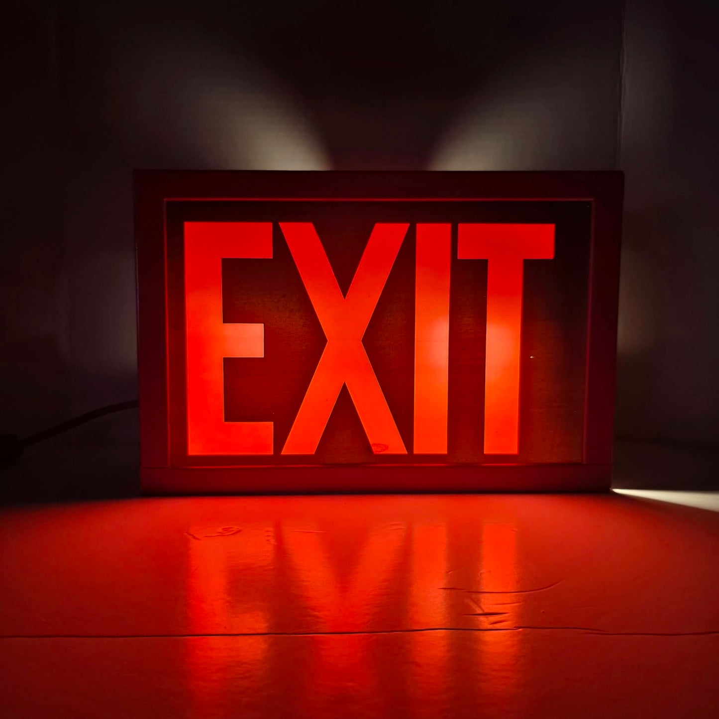 Functional vintage theater exit sign with original glass and toggle switch.