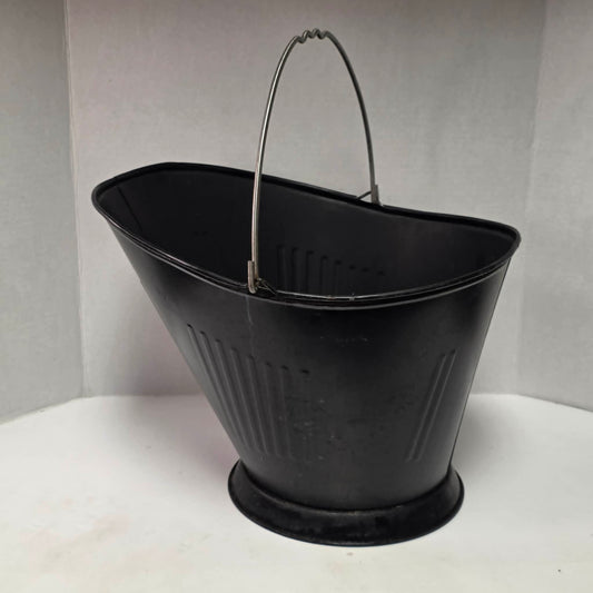Vintage metal coal scuttle with bail handle for fireplace and wood stove use.
