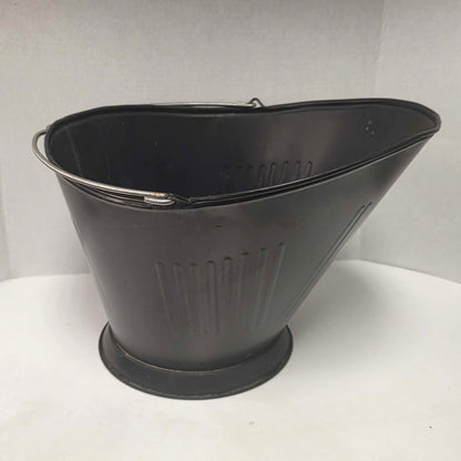Vintage metal coal scuttle with bail handle for fireplace and wood stove use.
